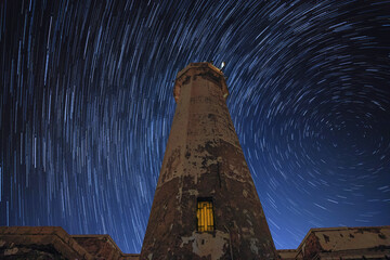 Faro del Plemmirio con dietro star trail 