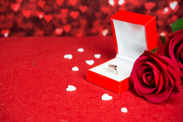 Engagment background (ring, flowers, red background)