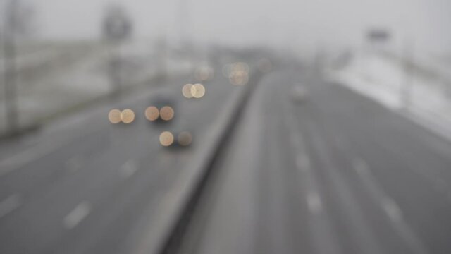 Blurred highway traffic. Cars driving on Minsk Beltway in winter