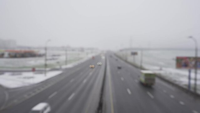 Blurred highway traffic. Cars driving on Minsk Beltway in winter