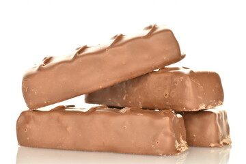 Several sweet chocolate bars, close-up, isolated on white.