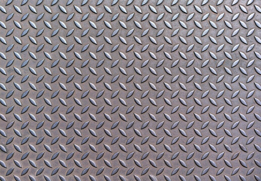 Background of old rusty metal diamond plate
