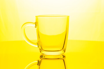 Tea mug made of transparent glass.Close-up.