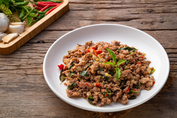 Stir-Fried Minced Pork with Basil on white plate