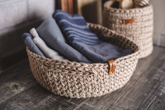 Eco friendly jute knitted baskets with reusable kitchen towel. Zero waste concept. Decor, interior