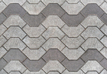 Footway street pavement background with gray combined paving