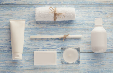 spa accessories on a blue wooden surface
