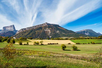 Fototapeta na wymiar French countryside. Clelles: view of the heights of the Vercors, the marly hills and the valley Val de Drome, France