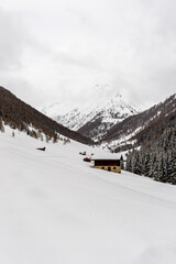 Fototapeta na wymiar alm valley in winter with a lot of snow