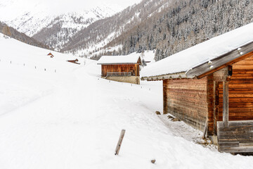 alm valley in winter with a lot of snow