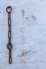 
old wall with chain