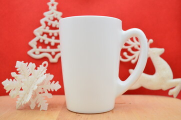 Cup Mockup Christmas. White mug on red background.
