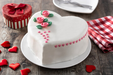Heart cake for St. Valentine's Day, Mother's Day, or Birthday, decorated with roses and pink sugar hearts