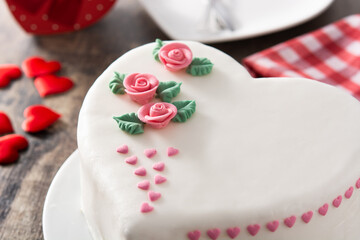 Heart cake for St. Valentine's Day, Mother's Day, or Birthday, decorated with roses and pink sugar hearts