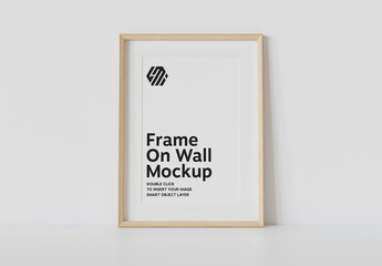 Wood Frame Leaning on Wall Mockup