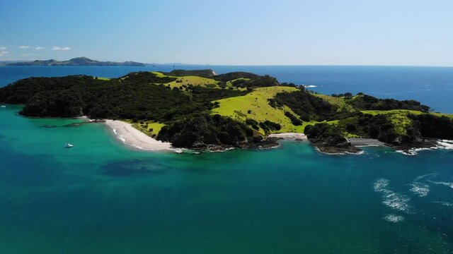 Drone fly on Waewaetorea Island, small tropical island in Bay of Islands. Beautiful summer sunny day