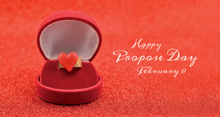 Propose Day Poster with ring with red heart shape stock images. Engagement ring in gift box isolated on a red background images. Propose Day Poster, February 8. Important day