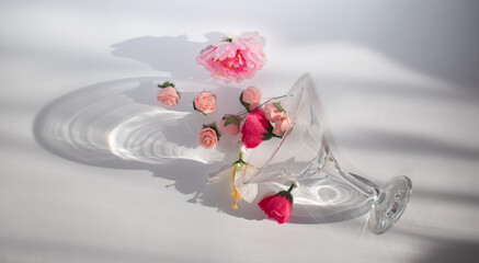 Festive flower arrangement in a glass on a white background. 