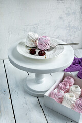 vanilla and cherry marshmallows on a white stand. handmade dessert.