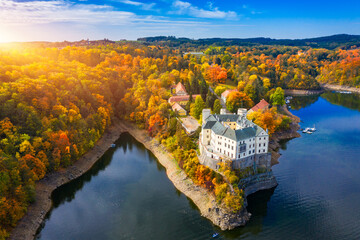 Aerial view chateau Orlik, above Orlik reservoir in beautiful autumn nature. Romantic royal Schwarzenberg castle above water level. Czechia. Orlik castle across the River Vltava, Czech Republic. © daliu