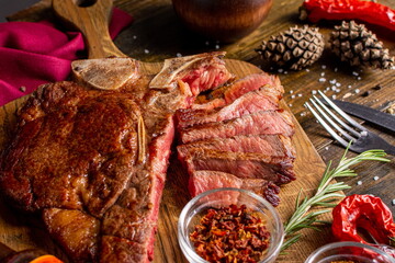 ham and seasonings on a wooden table.