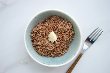Buckwheat with butter in a small bowl