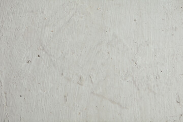 texture of old white plaster, close-up of flaws.