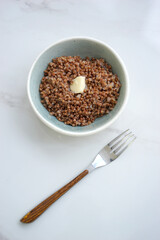 Buckwheat with butter in a small bowl