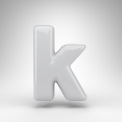 Letter K lowercase on white background. White plastic 3D rendered font with glossy surface.