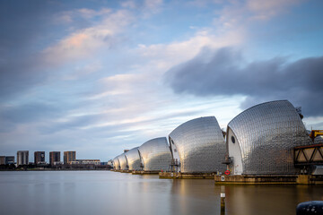 Long exposure view Thames barrier, a retractable barrier system designed to prevent the floodplain...