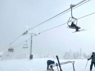 Ski chairs and fresh snow pow at Swowe Mountain ski resort, VT USA