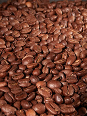 Coffee cup and coffee beans on the table