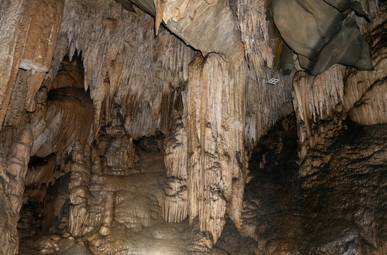 view of stalactites and stalagmites inside the cave
