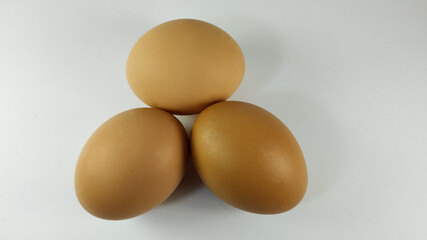 3 Chicken eggs, isolated on white background