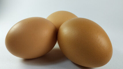3 Chicken eggs, isolated on white background