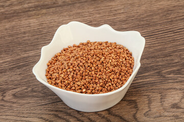 Raw buсkwheat cereal in the bowl