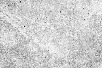 Texture of a concrete wall with cracks and scratches which can be used as a background