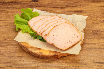 Boiled pork sausage over board