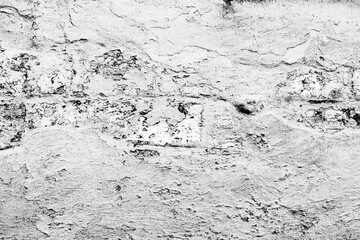 Texture of a concrete wall with cracks and scratches which can be used as a background