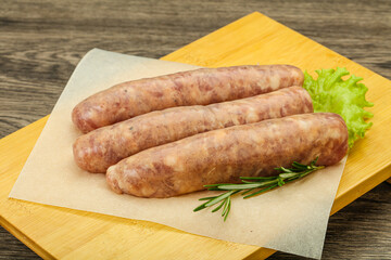Raw pork meat sausages for grill