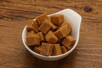 Cane sugar cubs in the bowl