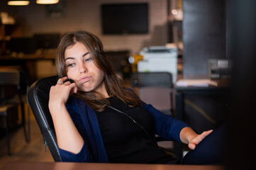 Beautiful caucasian woman call center operator at work desk.
