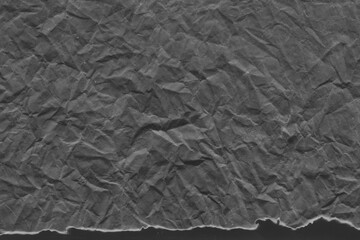 Cardboard black abstract texture close-up. Dark old paper background. Grunge concrete wall. Vintage blank wallpaper.