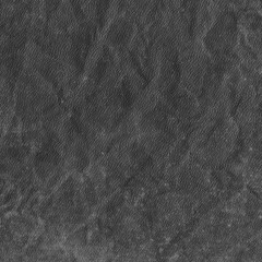 Cardboard black abstract texture close-up. Dark old paper background. Grunge concrete wall. Vintage blank wallpaper.