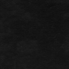 Cardboard black abstract texture close-up. Dark old paper background. Grunge concrete wall. Vintage blank wallpaper.