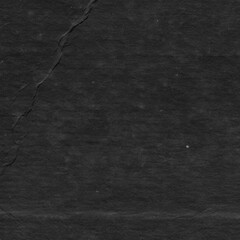 Cardboard black abstract texture close-up. Dark old paper background. Grunge concrete wall. Vintage blank wallpaper.