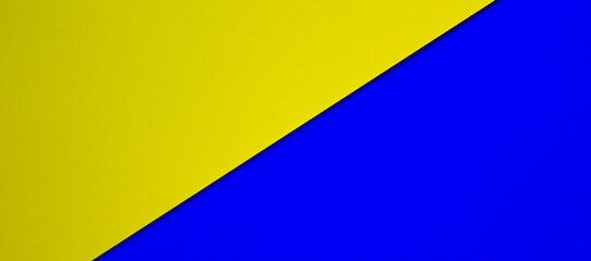 Colored paper texture. Geometric figure. Yellow color and blue color. Beautiful yellow and blue background. Concept.