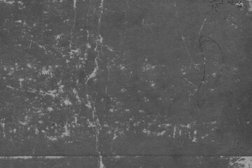 Cardboard black abstract texture close-up. Dark old paper background. Grunge concrete wall. Vintage blank wallpaper.