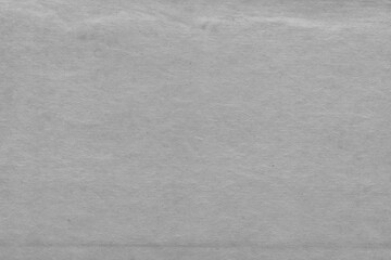 Fototapeta premium Cardboard black abstract texture close-up. Dark old paper background. Grunge concrete wall. Vintage blank wallpaper.