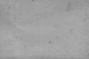 Cardboard black abstract texture close-up. Dark old paper background. Grunge concrete wall. Vintage blank wallpaper.